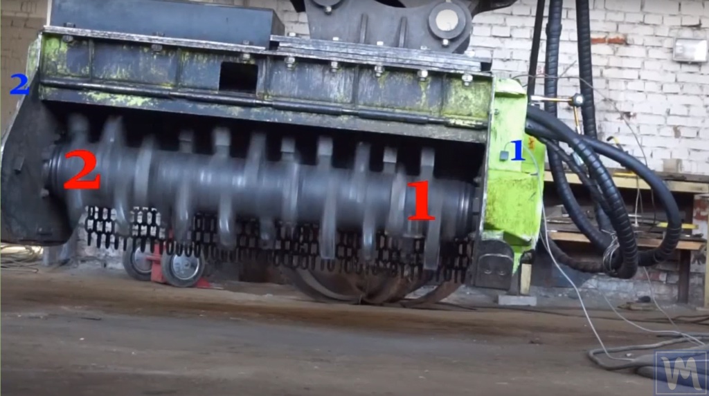 Mulcher rotor showing correction planes (blue 1 and 2) and weight installation points (red 1 and 2)